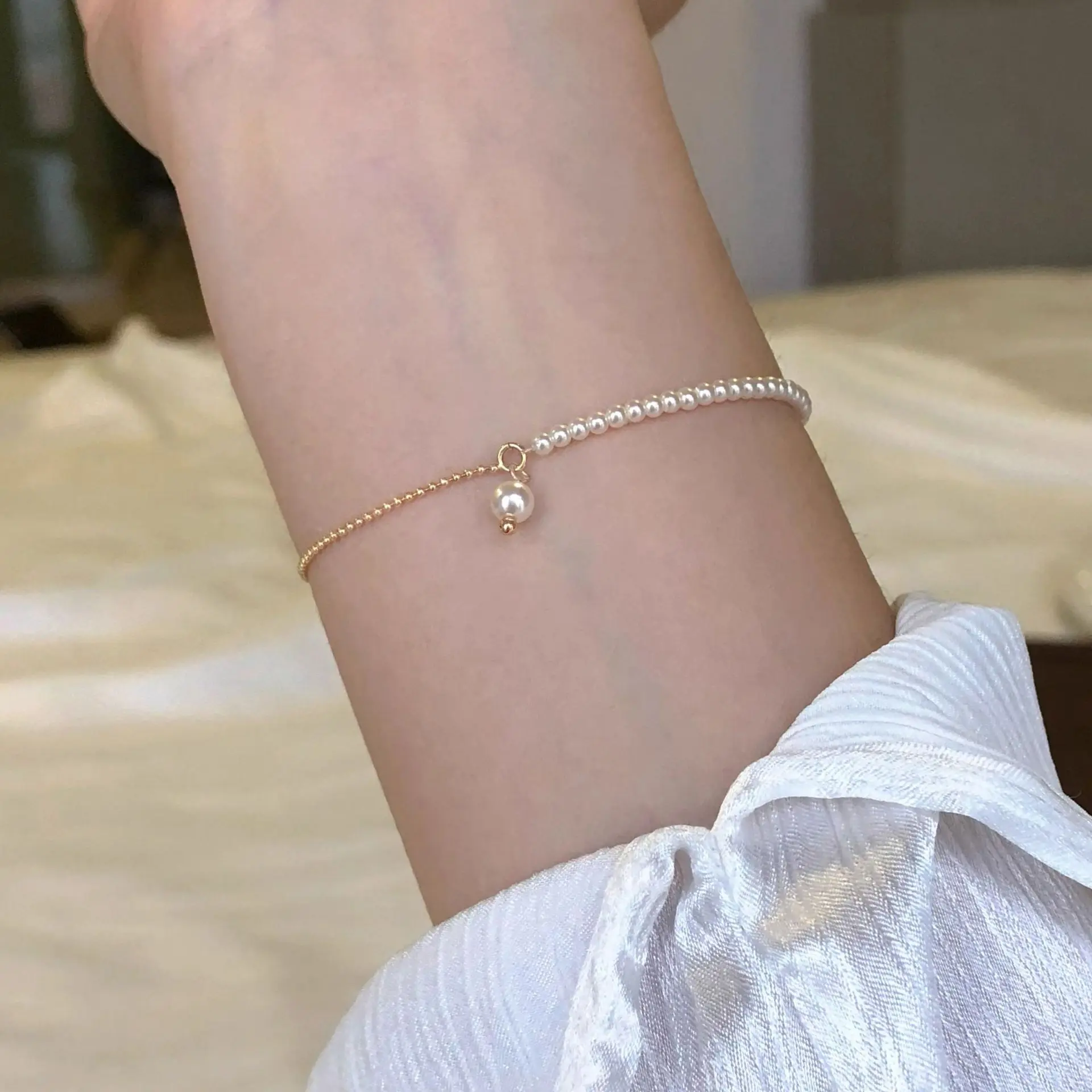 Женский браслет из серебра 925 пробы с жемчугом