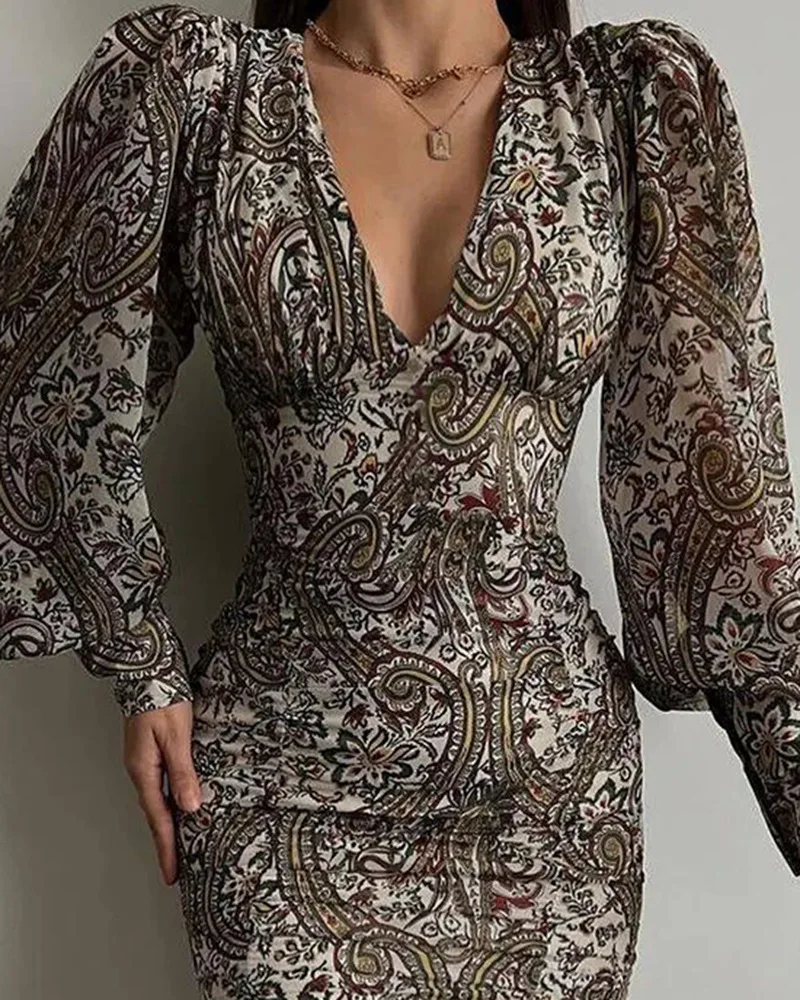

2022 Spring New Dress Feminine Commuter V-neck Printed Bubble Sleeve Tight Skirt