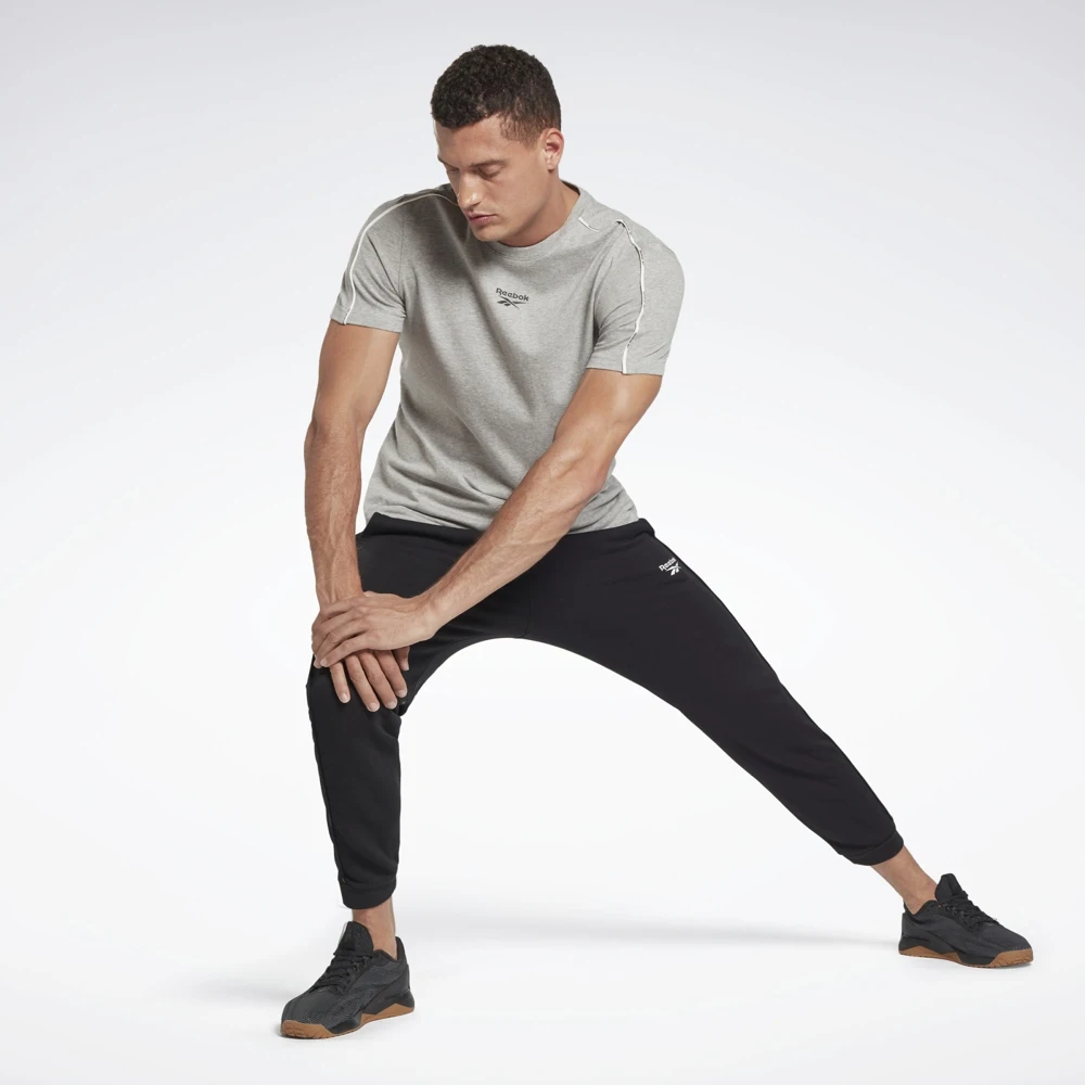 Спортивные брюки мужские Reebok Workout Ready Piping Joggers Pants HA1070 черный |