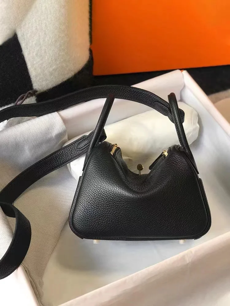 

2023 Designer luxury the new leather oblique satchel female mini pillow bag shoulder bag sensory niche design trend and lovely