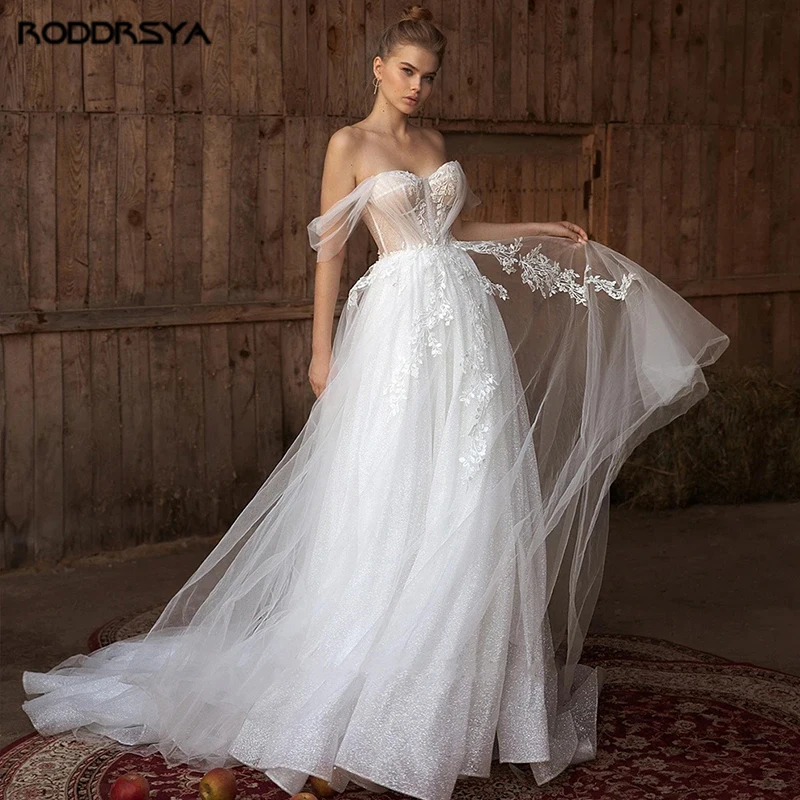 

RODDRSYA Pastrol Sweetheart Wedding Dresses For Women Short Sleeve Off Shoulder Applique Bride Gown Shiny Tulle vestido de novia