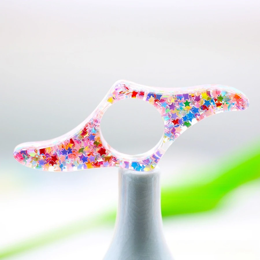 

Акриловая подставка для большого пальца с блестящей звездой