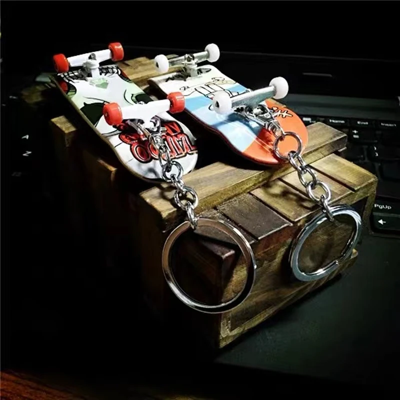 

Hot Sale Finger Skateboard Keyring Beer Bottle Opener Key Chain Metal Scooter Keychain