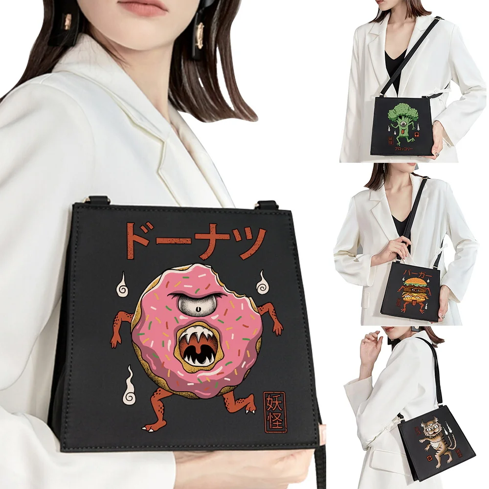 

The new trend single product senior shoulder bag woman diagonal bag cute monster pattern printing commuter bag mobile phone bag