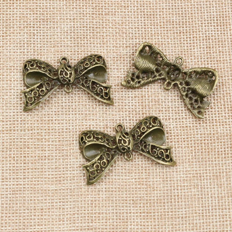 

4pcs 2x25mm Antique Bronze Plated Bow Tie Handmade Charms Pendant:DIY for bracelet necklace