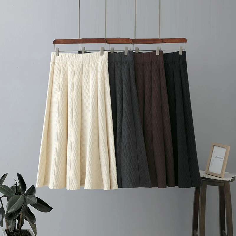 

Sweater skirt autumn/winter new women's clothing 2022 knitted high-waisted midi commuter style solid color versatile skirt