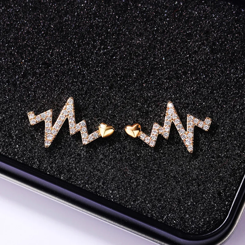 

Ne'w Delicate Heartbeat Shaped Stud Earrings Female with Dazzling CZ Simple Stylish Women Accessories Versatile Jewelry 2021