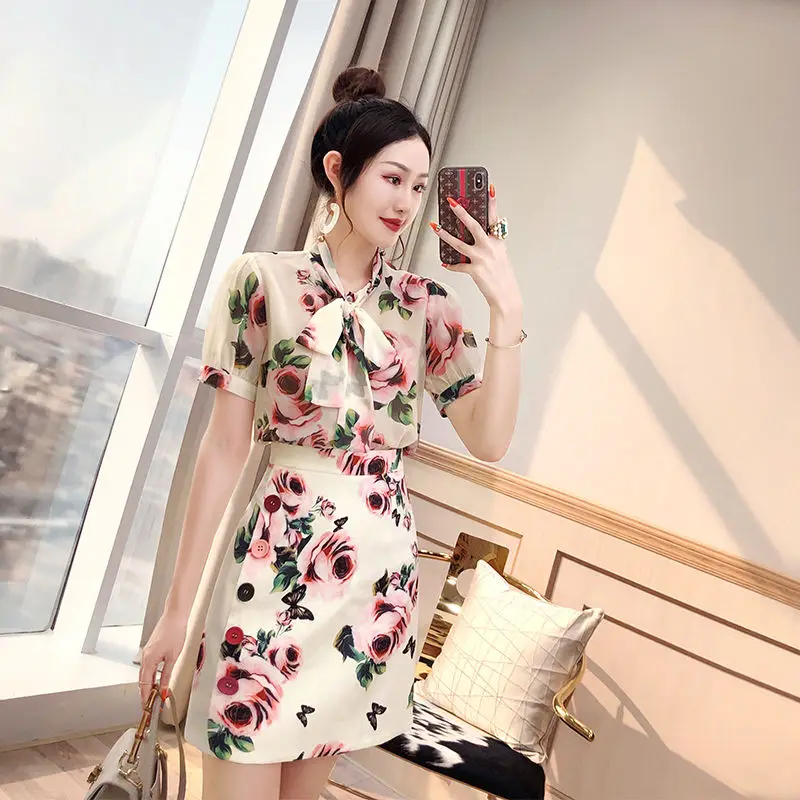 

Women 2022 Summer New Two-piece Sets Female Short Sleeve Bow Shirt Tops + High Waist A-line Skirts Ladies Flower Print Suits R87