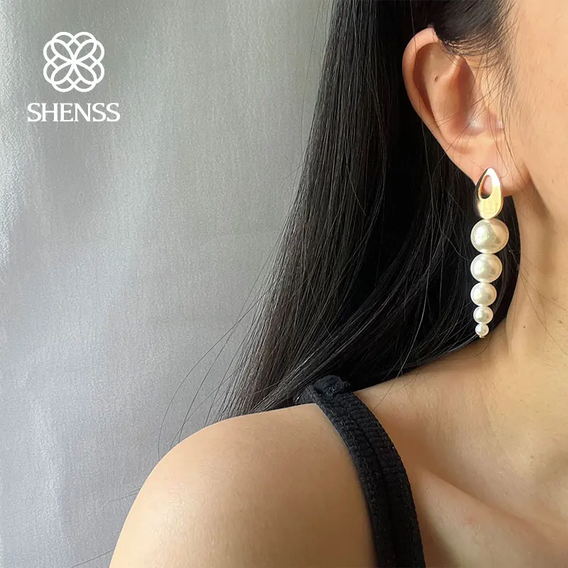 

Temperament shell pearl earrings