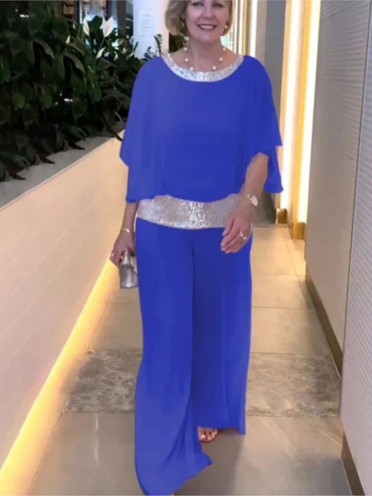 Женский офисный костюм с блестками элегантный розовый круглым вырезом летний