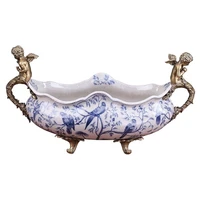european style retro decorated fruit bowl oval wavy mouth ceramic fruit bowl with two brass angels for living room home decor