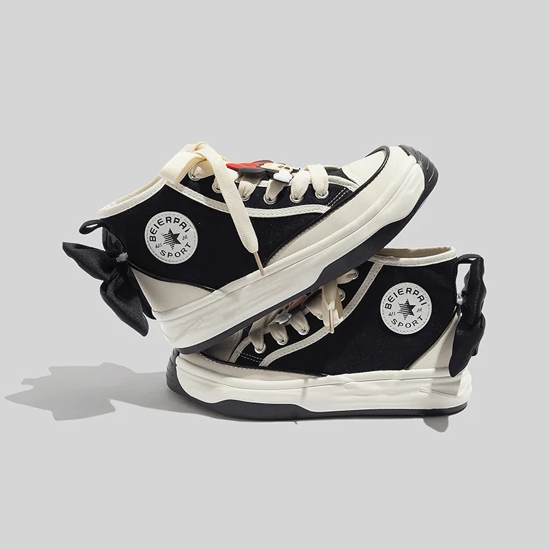 Рисунок 4 - Туфли женские высокие холщовые с бантом