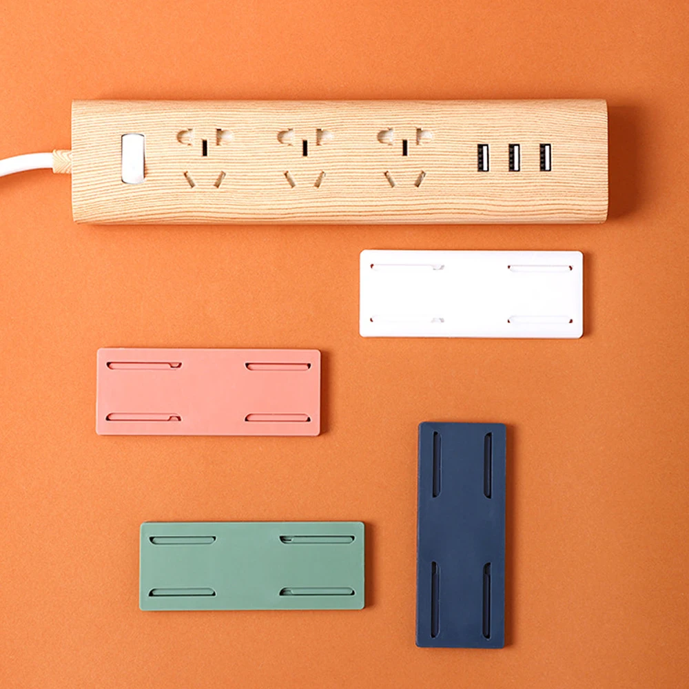 

Wall-Mounted Plug Fixer Sticker Punch-free Home Self-Adhesive Socket Fixer Cable Wire Organizer Seamless Power Strip Holder