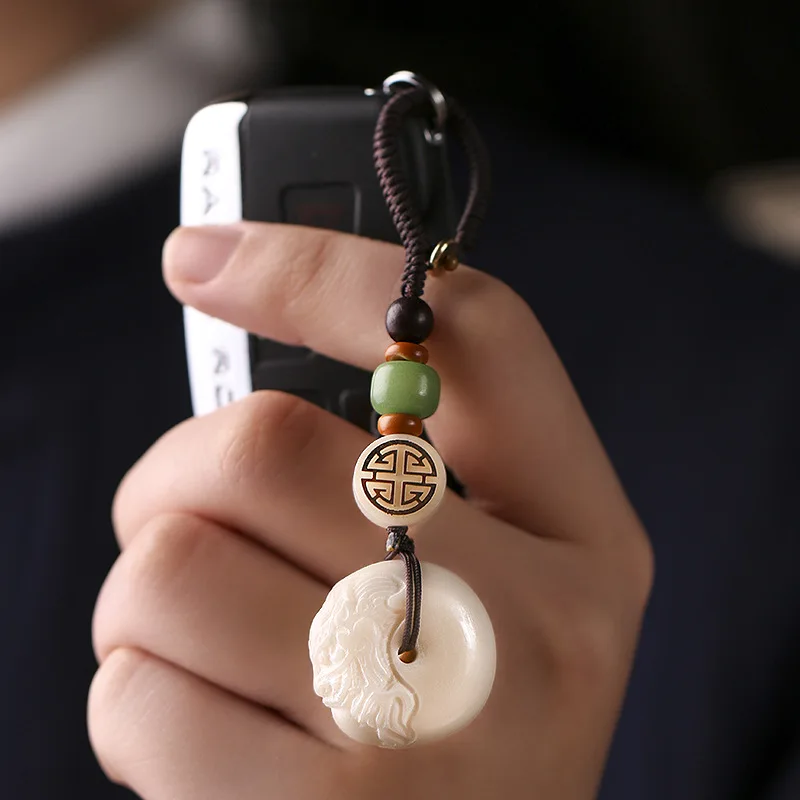 

Ivory fruit DIY PI PI safe buckle men and women hand-woven car pendant personality good luck creative gifts