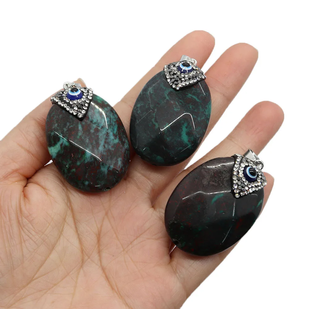 

Natural Stone Oval Hainan Pine Pendant 30x45mm Inlaid Rhinestone Eyeball Jewelry Charm DIY Necklace Earrings Fashion Accessories