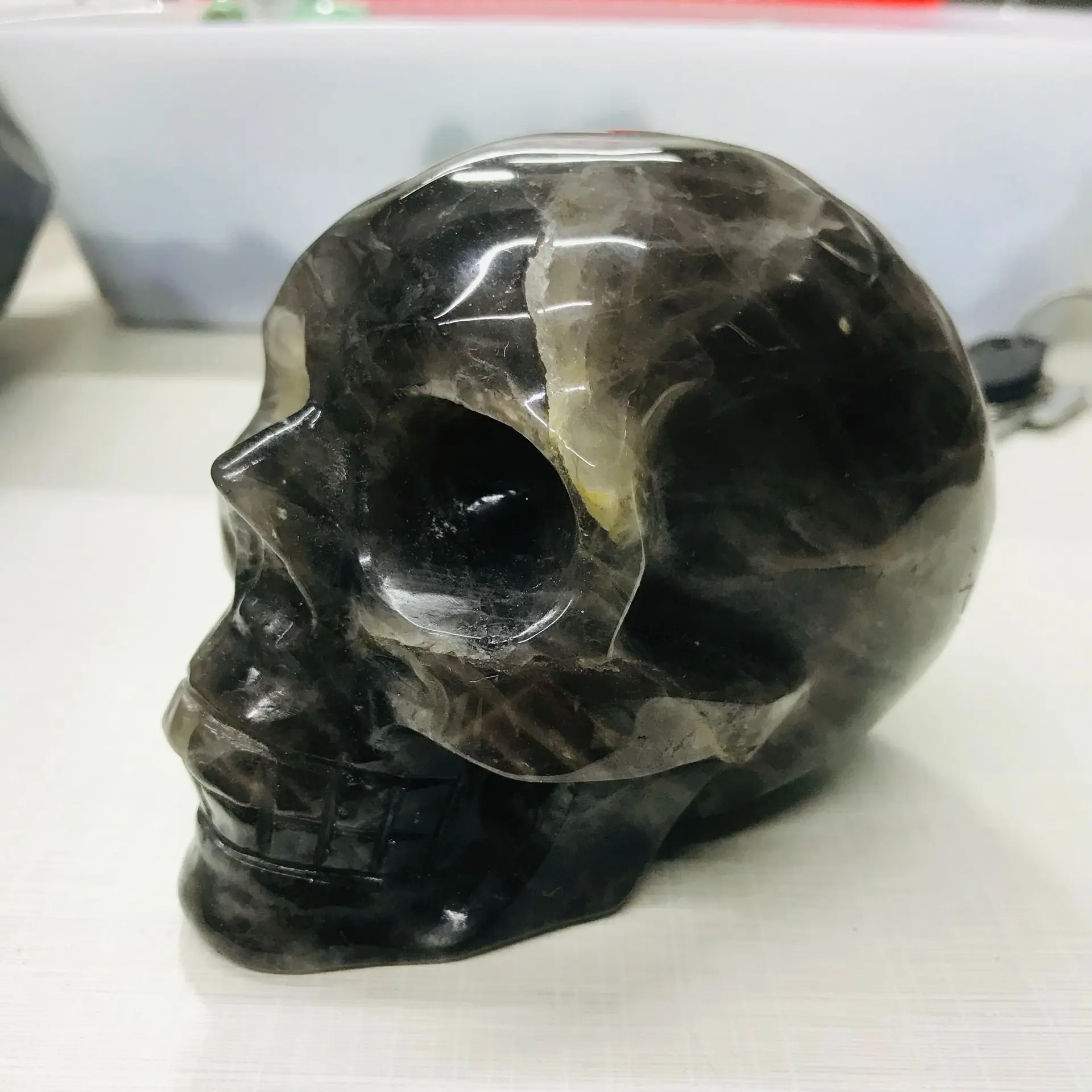 TEA CRYSTAL HEAD SKULL , REALLY THE BIGGER THE MORE BEAUTIFUL, WITH A POWERFUL LOVE HEALING STONE