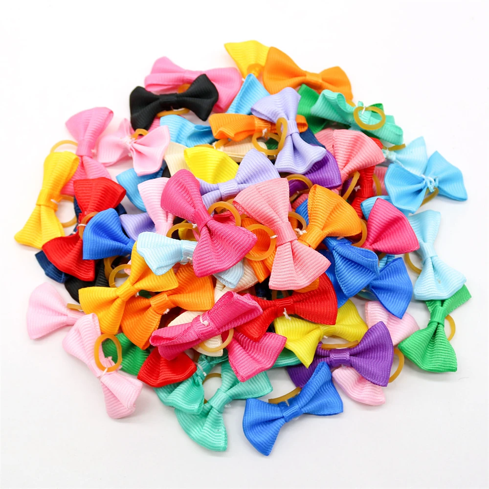 

100pcs Dog Bowknot Pet Dogs Hair Bows Puppy Party Grooming Decorate Solid Color Bows With Rubber Band Cat Headwear Accessories