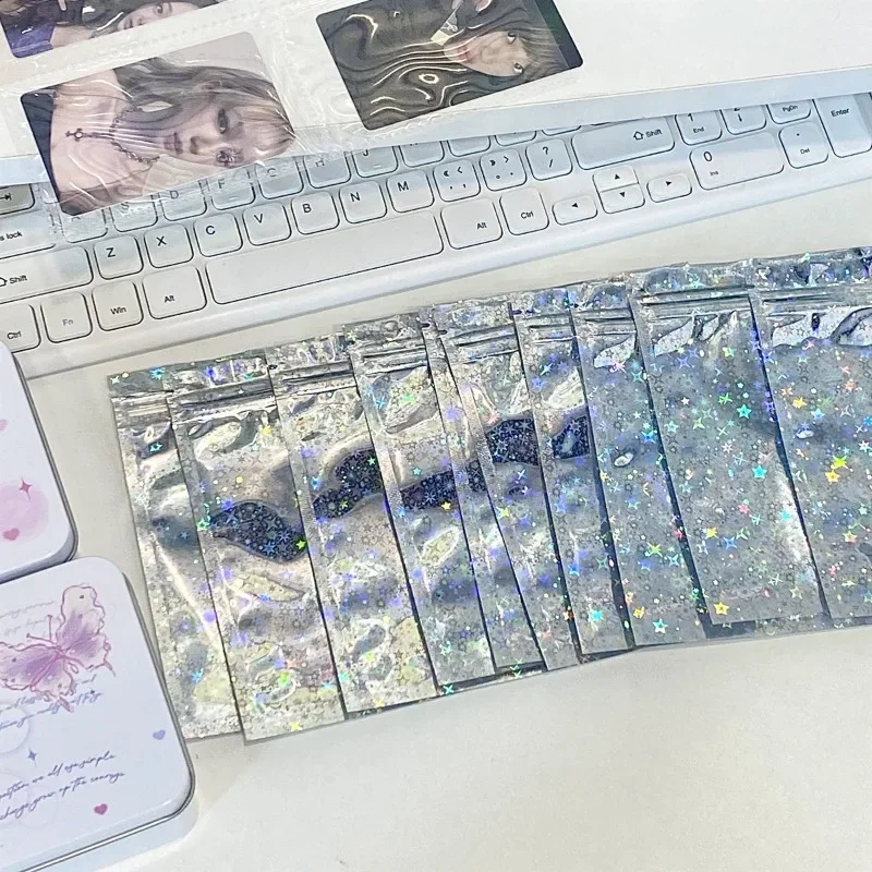 

Набор из 10 блестящих лазерованных сумок для фотокарт