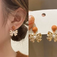 ins cute white bow spot stud earrings korean fashion pearl leather elegant ear studs new fashion women party jewelry wholesale