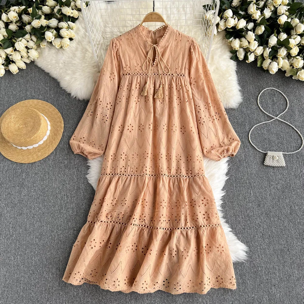 

Literary and artistic small fresh round neck hollowed out flower embroidery loose long skirt holiday style French temperament