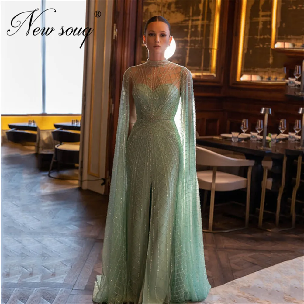 

Sparkly Beaded Mint Long Evening Dresses Elegant Slit Backless Celebrity Dresses With Cape Dubai Couture Party Engagement Dress