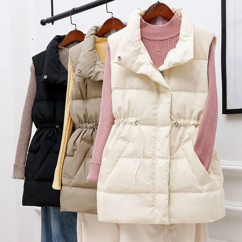 Брендовый счетчик утечек. Женская одежда. Безосезонный пуховый жилет. Женский