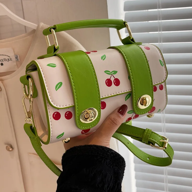 

Summer niche trend design cherry hand bag 2022new fashion all-match printing small square bag high-quality texture messenger bag
