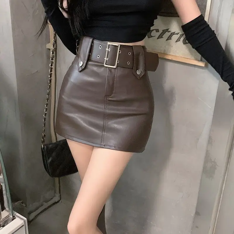 Hot Girl Short Skirt Bag Hip Skirt Female 2022 Autumn Winter Solid Sexy Club Belt Design High Waist Thin PU Leather Mini Skirt