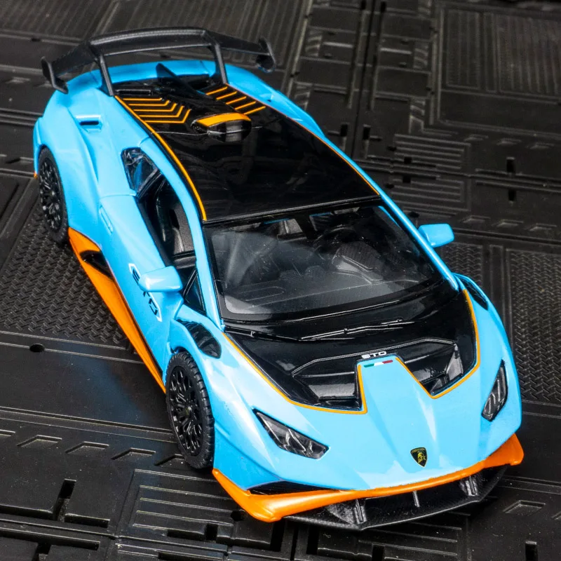 Модель автомобиля Lamborghini STO от Rastar в масштабе 1:32, из сплава, с открывающимися дверями и капотом, с имитацией звука и света. (art.: 3920da3e19e92) - 3920da3e19e92