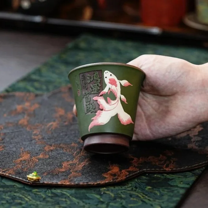 

Фиолетовая чайная чашка из глины Yixing