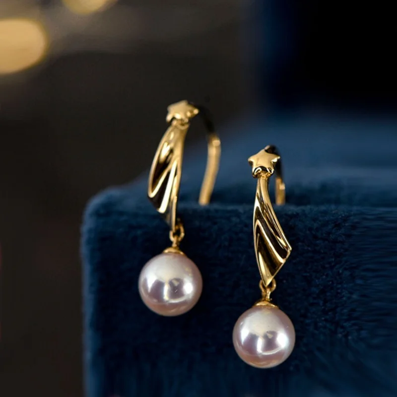 

Серьги-гвоздики с жемчужинами в виде трехмерных звезд являются умными, мягкими и не выцветают, популярные серьги с холодным ветром