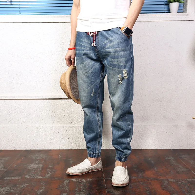 

Мужские джинсы, японские повседневные джинсовые брюки, хипстерские хип-хоп брюки, свободные шаровары большого размера, мужские Модные брюк...