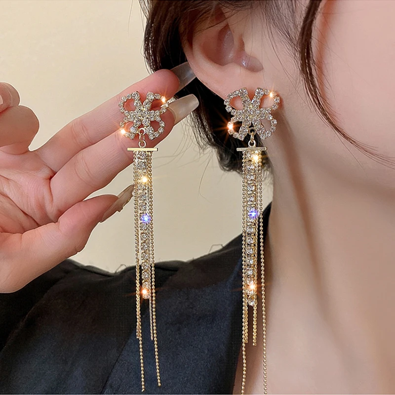 

DREJEW Golden Flower Drop Earrings for Women Sparkly Rhinestone Crystal Chain Long Tassels Earrings Party Wedding Jewelry