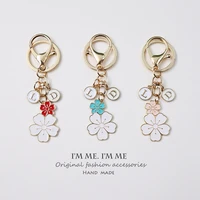 cute double sided two color flower girl keychain english letter pendant bag car key airpods hanging jewelry chain