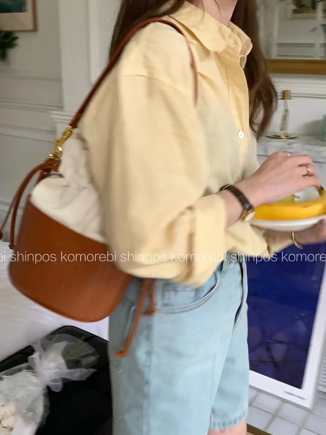

Small design leather bucket bag shoulder slung basket bag 2022 new women's bag