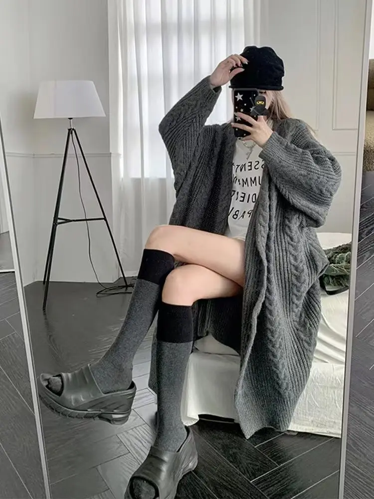 

2022 A small number of gray knit cardigan female autumn and winter new lazy wind loose in the long soft waxy sweater coat