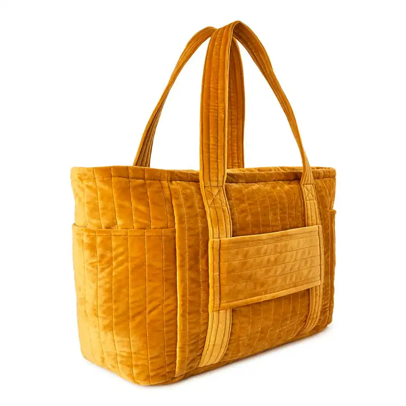

Luxurious Soft Quilted Women's Yellow Tote Handbag: An Elegant and Stylish Way to Carry Your Belongings.