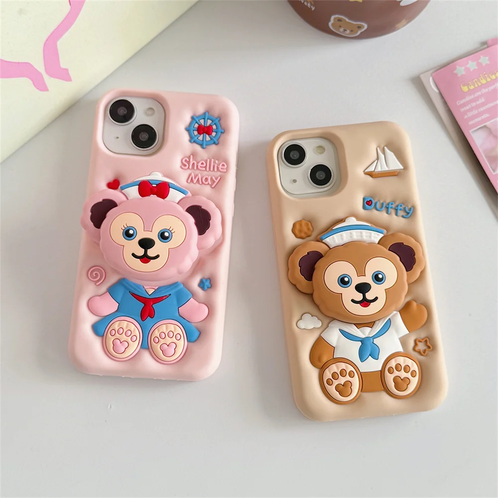 Фото Милый мультяшный чехол с медведем для iPhone 17, 16, 15 Plus, 14, 13, 12, 11, 16E, 17 Pro Max, с 3D-подставкой в виде Дэффи и Шерли Мэй №1