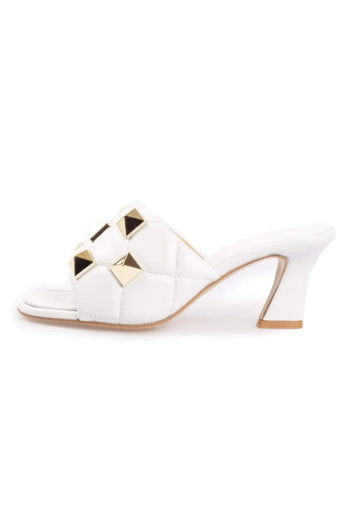 

White leather slippers