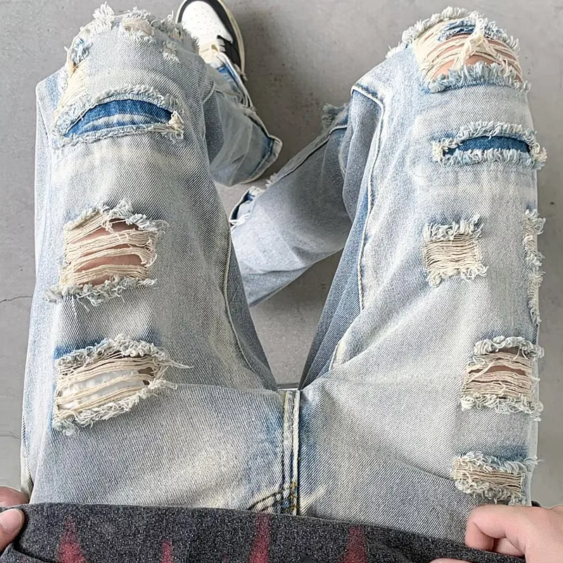 Брюки мужские рваные из денима с молнией на щиколотке