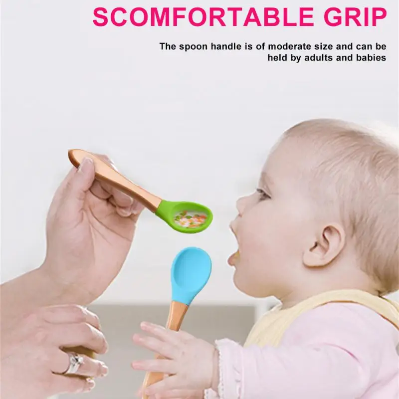 

1pcs Kitchen Utensils Food Grade Silicone Baby Feeding Spoon Baby Tableware Can Be Sterilized And Washed With Wooden Handle