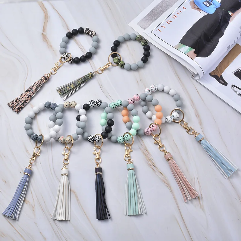 

Key Ring Bracelet Car Keychain Holder Wristlet Silicone Women Beaded Bangle Chains Acrylic Link Chain Leather Tassel Wholesale