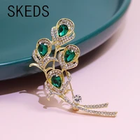skeds shining luxury brooches pins for women female camellia pearl accessories lady wedding party crystal brooch pin badges gift
