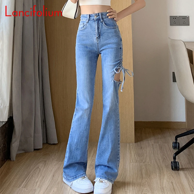 Женские дизайнерские рваные джинсовые брюки-клеш, облегающие синие брюки свысокой талией и завязками, модель 2022 на лето