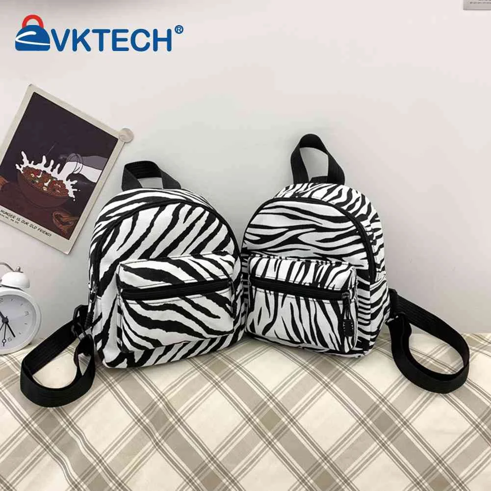 

Women Fashion Canvas Zebra Print Backpack Casual Portable Travel School Knapsacks Preppy Style Mini Rucksack Teenager Handbag