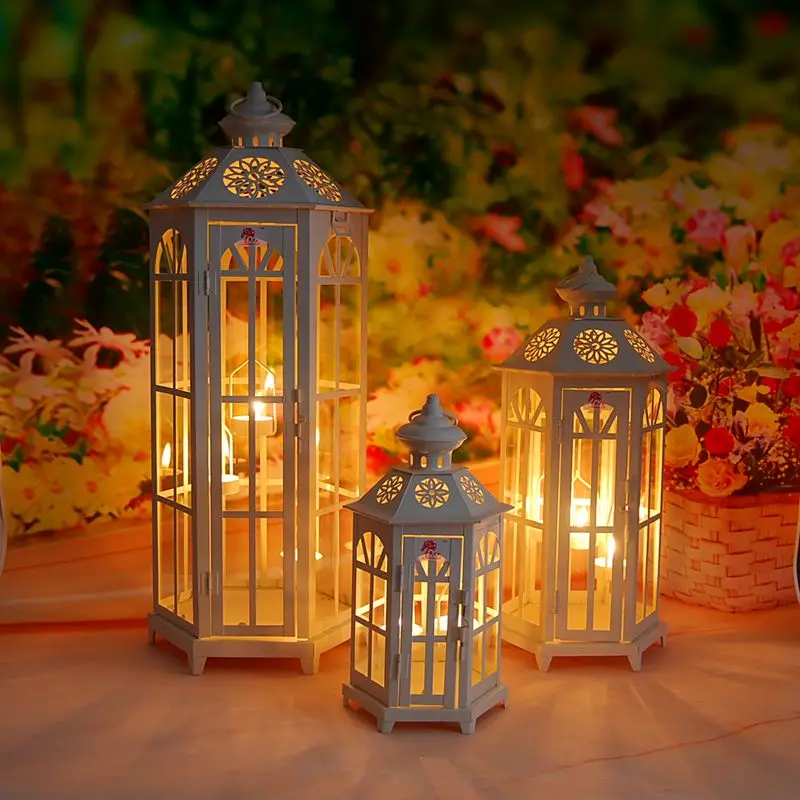 

Nordic Morocco Style Hollow Iron Painted Hexagon Lantern with Candle Sticks Portable Lights Table Lamp for Wedding Decoration