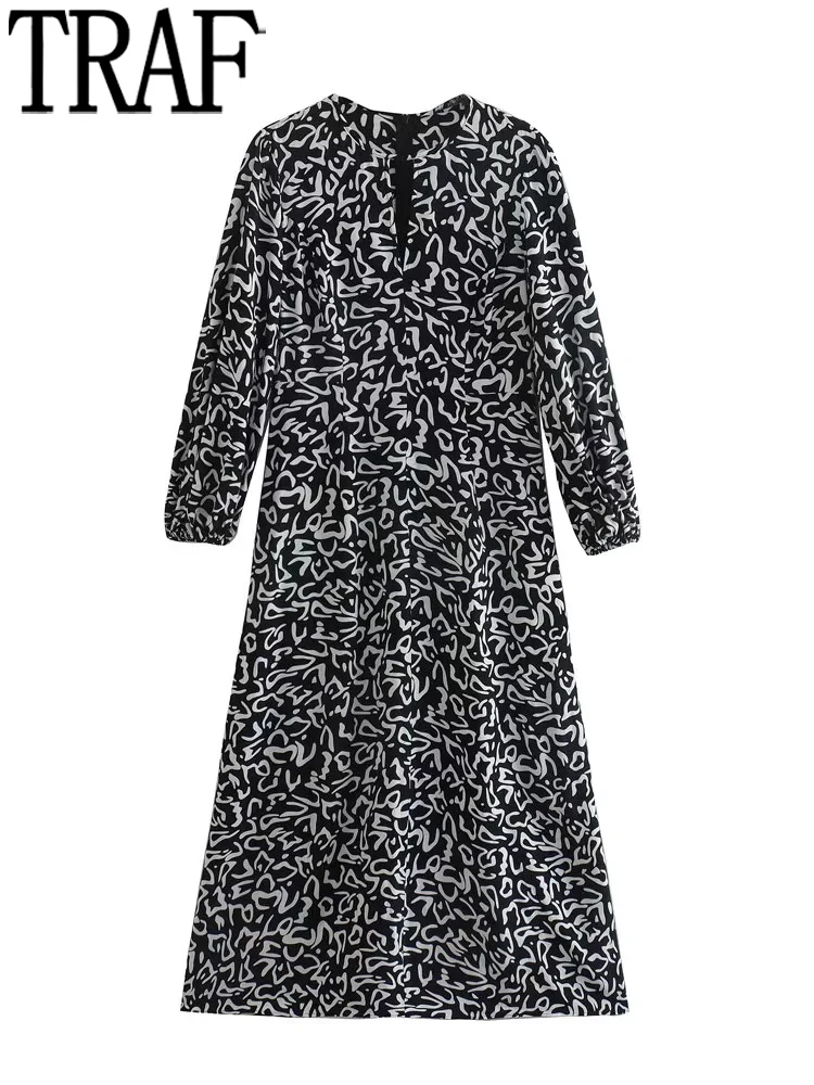 

Платье-миди черное длинное с принтом и длинным рукавом