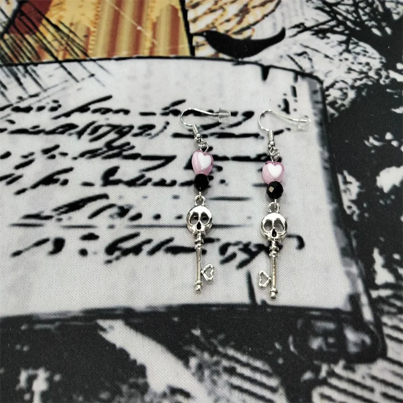 

pastel goth heart skull key charm earrings