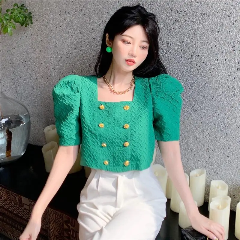 Make the net price of French small collar short jacket summer han edition female embossing hubble-bubble sleeve shirt double-bre |
