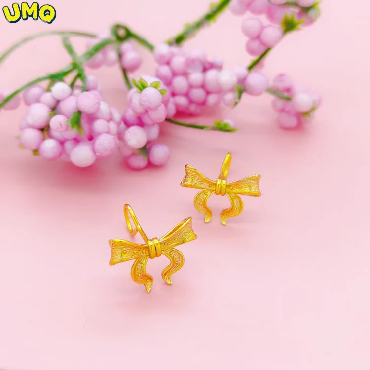 

Новые позолоченные серьги в виде банта в магазине Gold Shop, серьги из искусственного золота с имитацией песка и золотым бантом не выцветают в т...